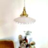 Lampe baladeuse opaline et son cordon tressé à personnaliser. Luminaire vintage Bloomis