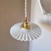 Lampe baladeuse en opaline et son cordon tressé à personnaliser. Luminaire vintage Bloomis