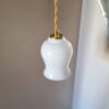 Lampe baladeuse en opaline et son cordon tressé à personnaliser. Luminaire vintage Bloomis