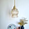 Suspension globe en verre ambré et câble torsadé, luminaire vintage Bloomis