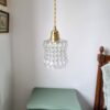 Lampe baladeuse globe verre et son cordon tressé à personnaliser. Luminaire vintage Bloomis