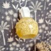 Applique murale en verre de clichy moucheté sur support en porcelaine. Luminaire vintage art déco Bloomis
