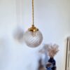 Lampe baladeuse globe verre et son cordon tressé à personnaliser. Luminaire vintage Bloomis