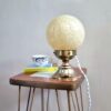Lampe à poser globe boule en verre de clichy jaune. Luminaire vintage art déco Bloomis