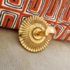patere-metal-dore-ancien-upcycling-accroche-mur-baladeuse_bloomis